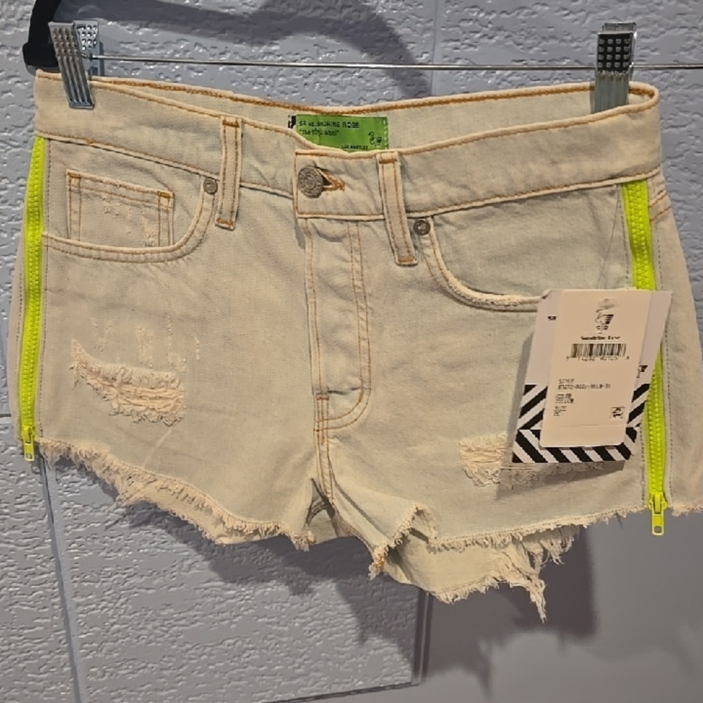 Trendy Cream Denim Shorts with Neon Zippers